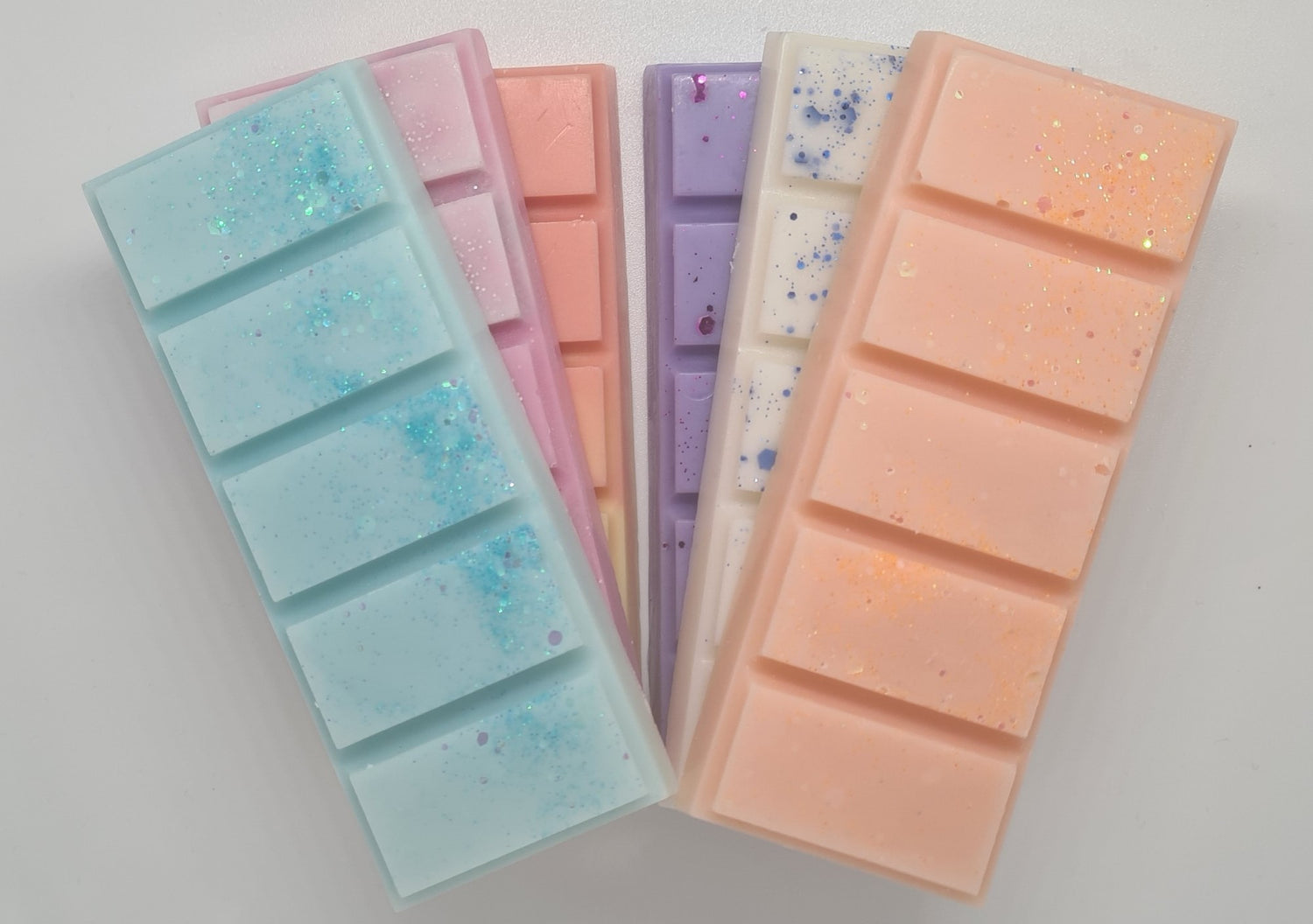 Immerse yourself in the opulent world of our exquisite snap bars, meticulously crafted from 100% natural wax that epitomizes sustainability and environmental consciousness.